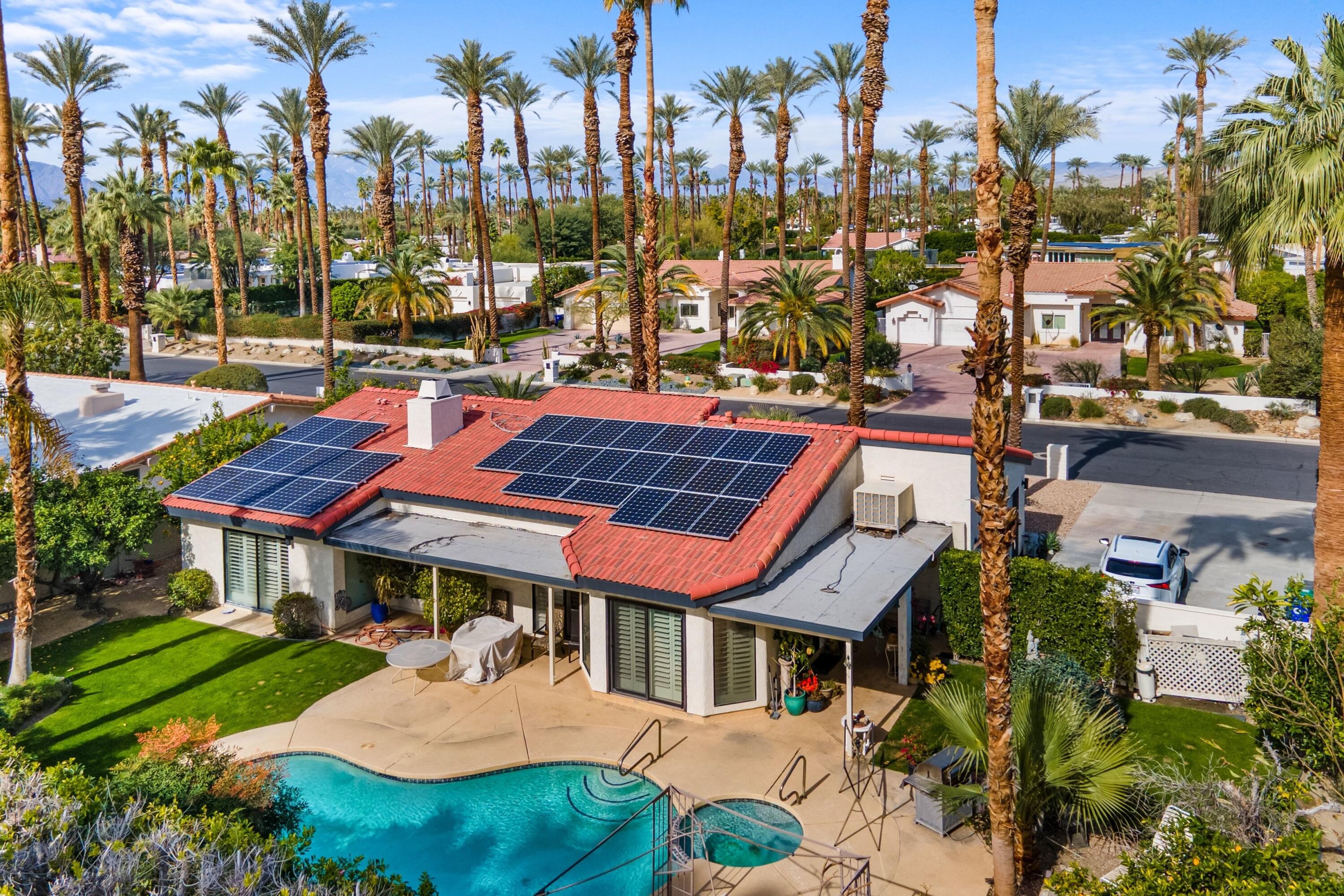 70451 Cobb Road Rancho Mirage, CA 92270 - Photo 13 of 13 a view of a white house with a yard