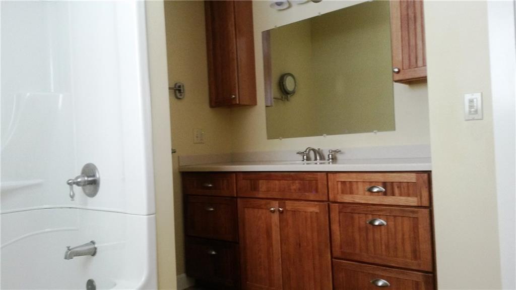 169 Chase Road Readfield, ME 04355 - Photo 16 of 35 Main bathroom with quality cabinets...