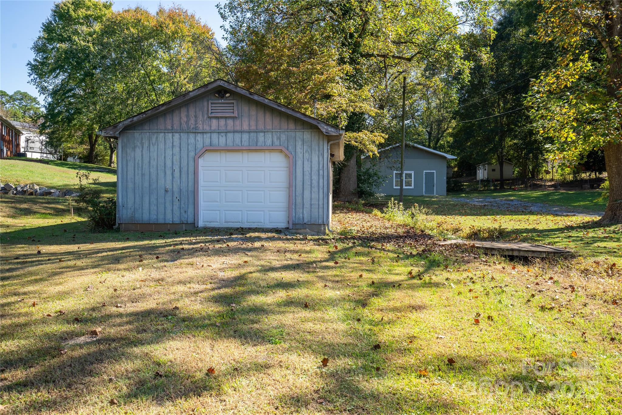 401 Little Street Lincolnton, NC 28092 - Photo 14 of 17 a view of a house with a yard