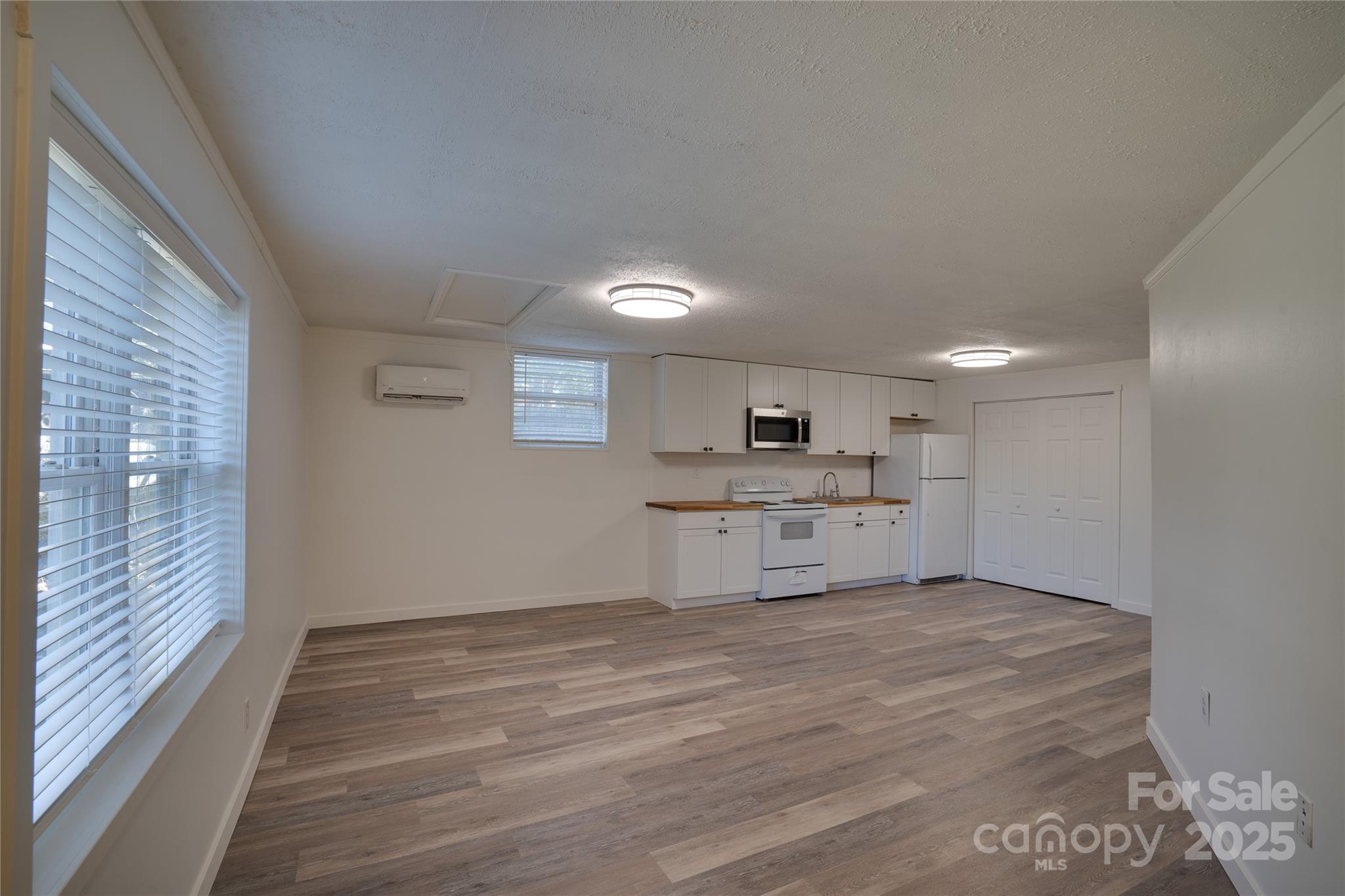 401 Little Street Lincolnton, NC 28092 - Photo 3 of 17 a view of kitchen with wooden floor
