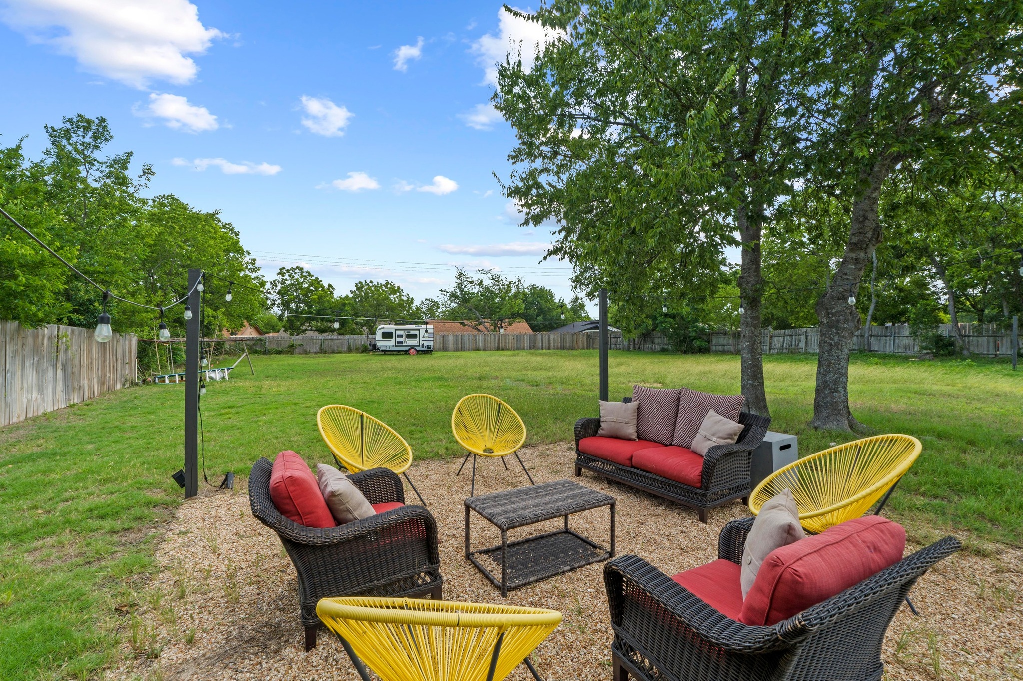 10601 Macmora Road, Unit B Austin, TX 78758 - Photo 20 of 22 An inviting outdoor gathering spot awaits, perfect for leisurely evenings under the open sky.