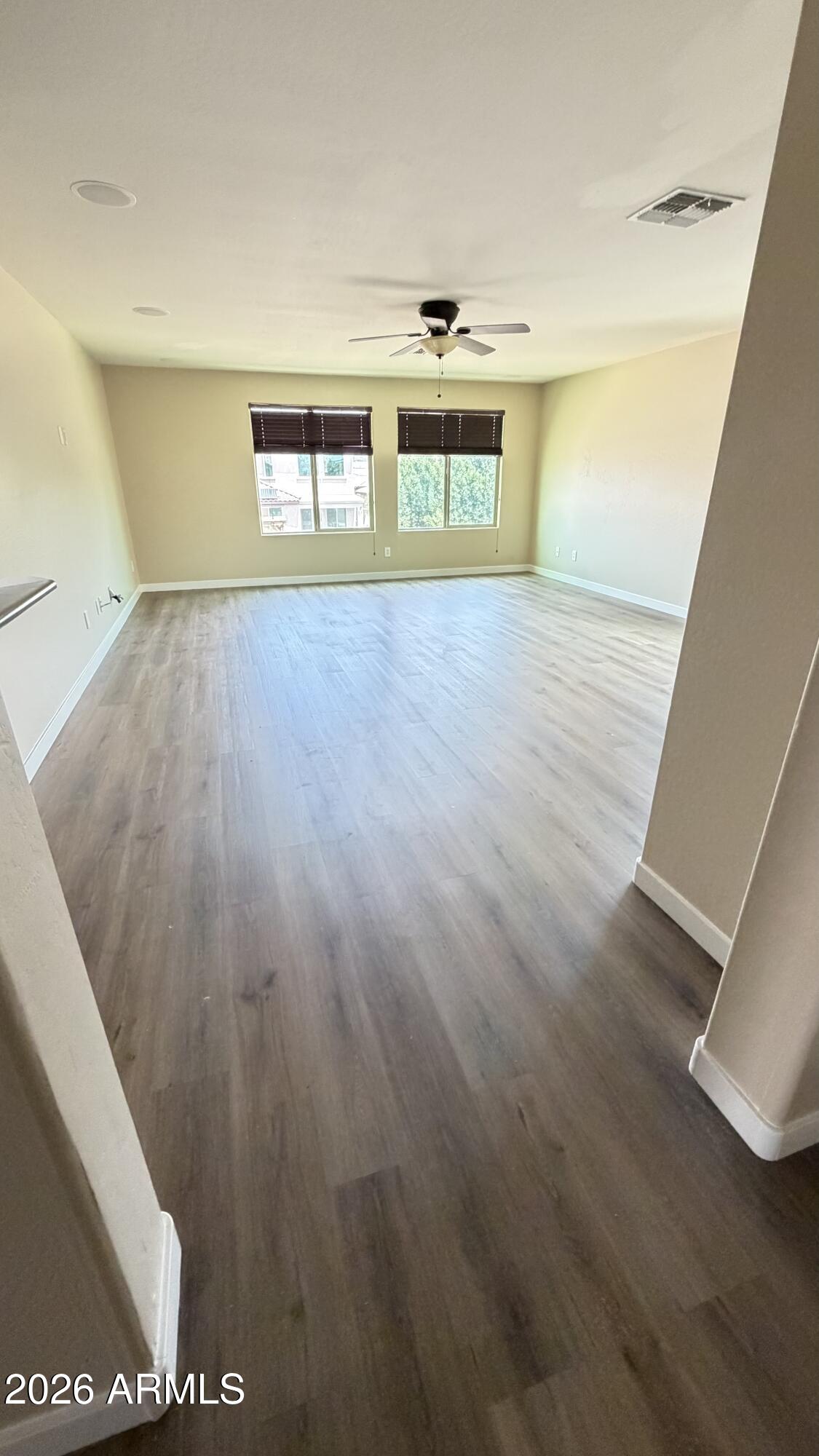 10786 West Yearling Road Peoria, AZ 85383 - Photo 19 of 21 a view of a room with wooden floor