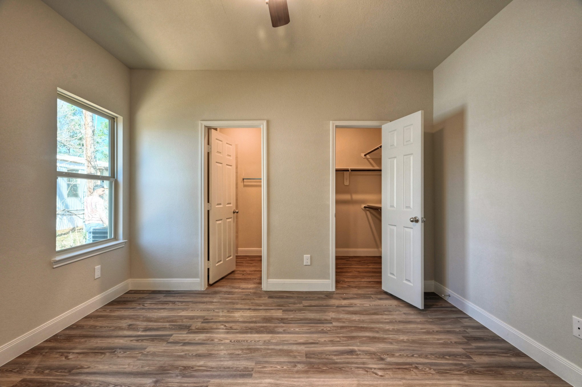 9173 Inwood Willis, TX 77318 - Photo 22 of 31 an empty room with window and wooden floor