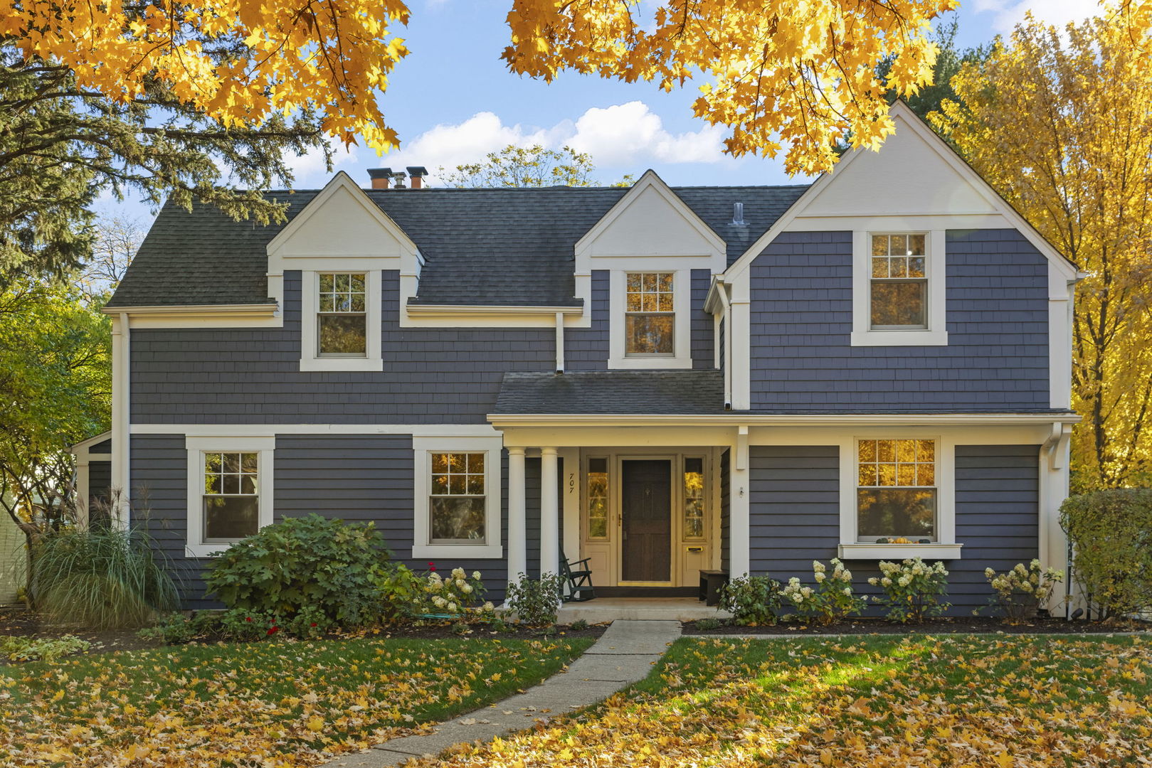 front view of a house with a yard