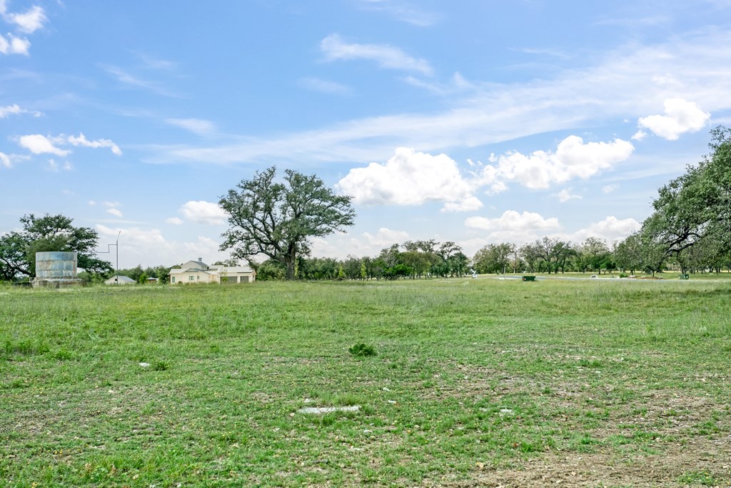 5 Inspiration Loop Fredericksburg, TX 78624 - Photo 5 of 14 a backyard of a house with lots of green space