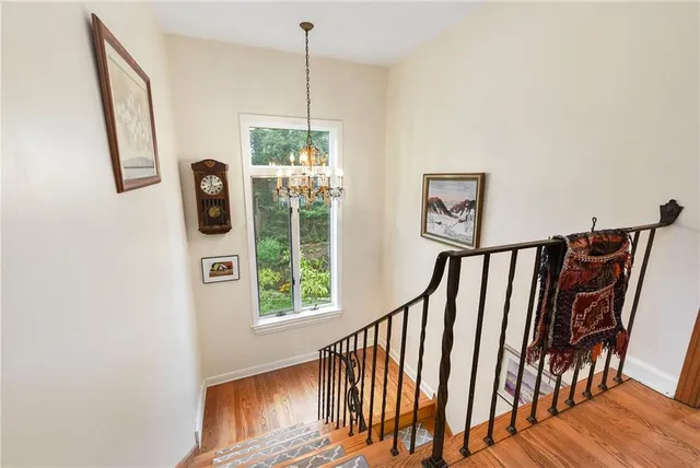 a view of a hallway with windows