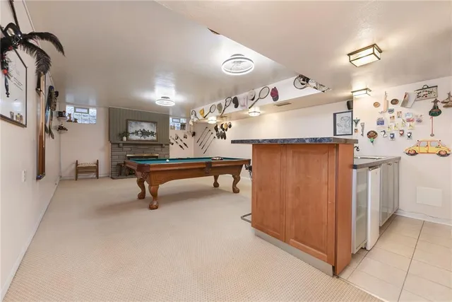 a view of kitchen with furniture and cabinets