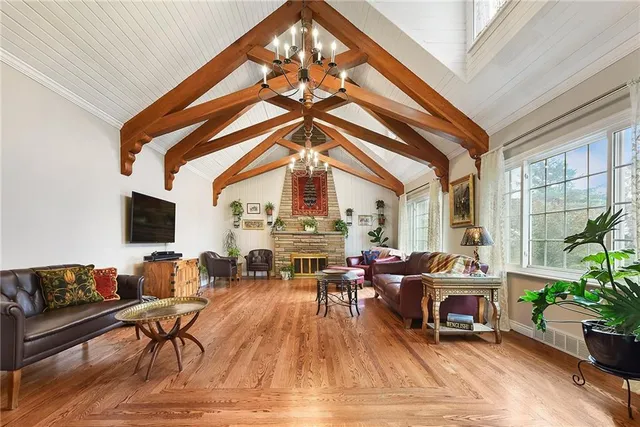 a living room with furniture or fireplace and a potted plant