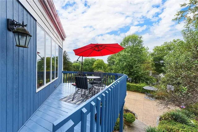 a house with a tree in front of it