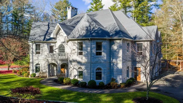 a view of house with yard and green space