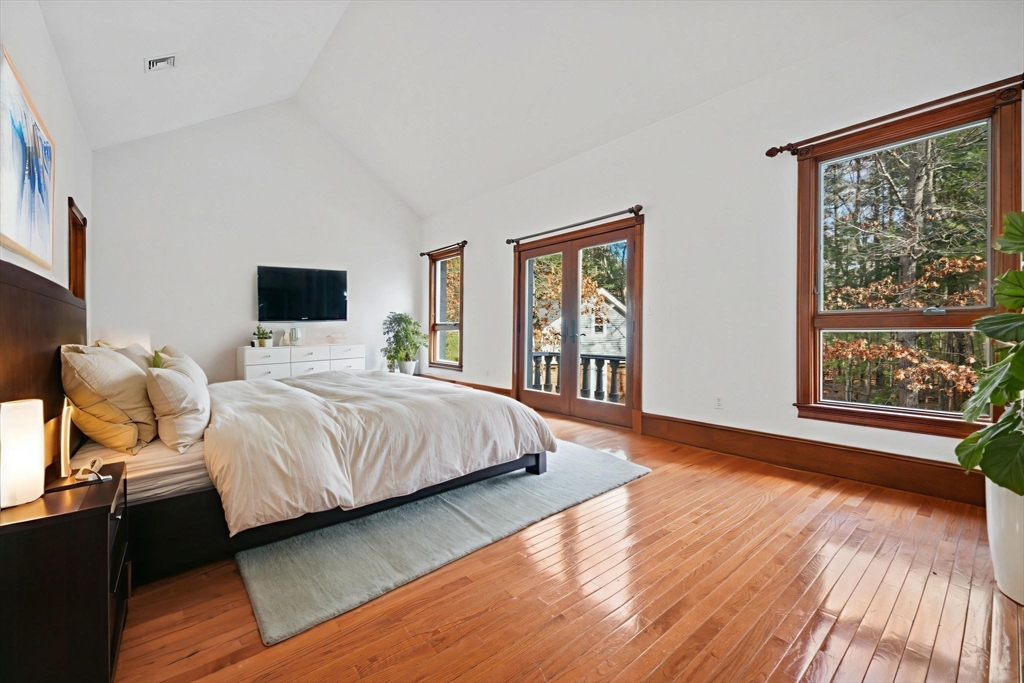 219 Chase Road Dartmouth, MA 02747 - Photo 23 of 42 a bedroom with a bed and window