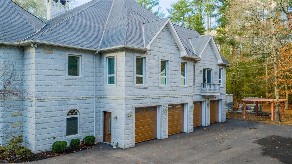 219 Chase Road Dartmouth, MA 02747 - Photo 36 of 42 a front view of a house with a yard