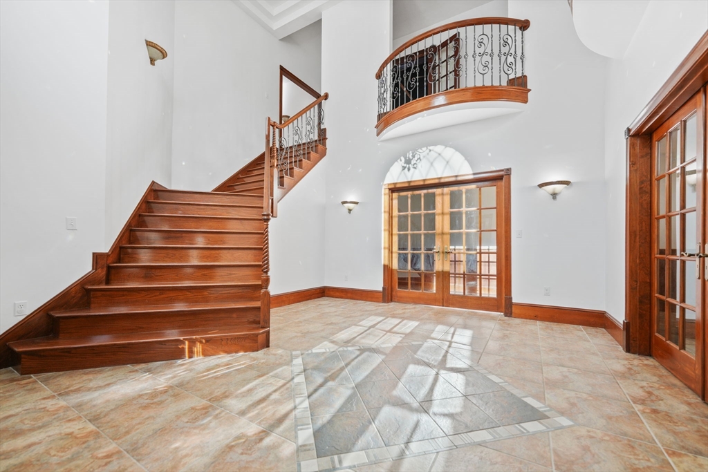 219 Chase Road Dartmouth, MA 02747 - Photo 6 of 42 a view of entryway and hall with wooden floor