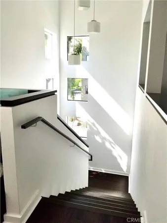 a hallway with windows