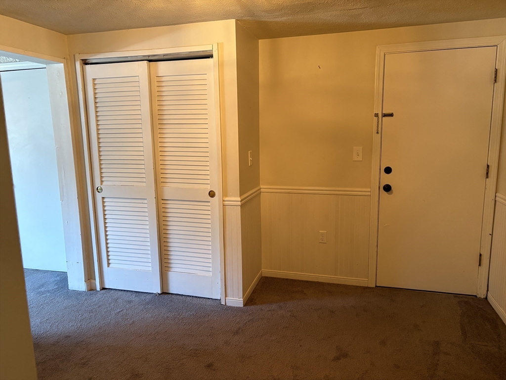 24 Spencer Road, Unit 12N Boxborough, MA 01719 - Photo 7 of 12 a view of closet area with window