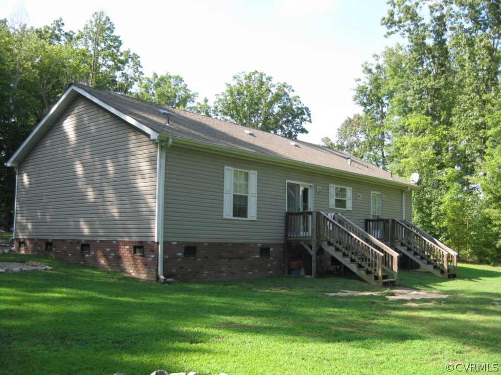 4520 Plank Road Kenbridge, VA 23944 - Photo 6 of 13 a view of a house with a yard