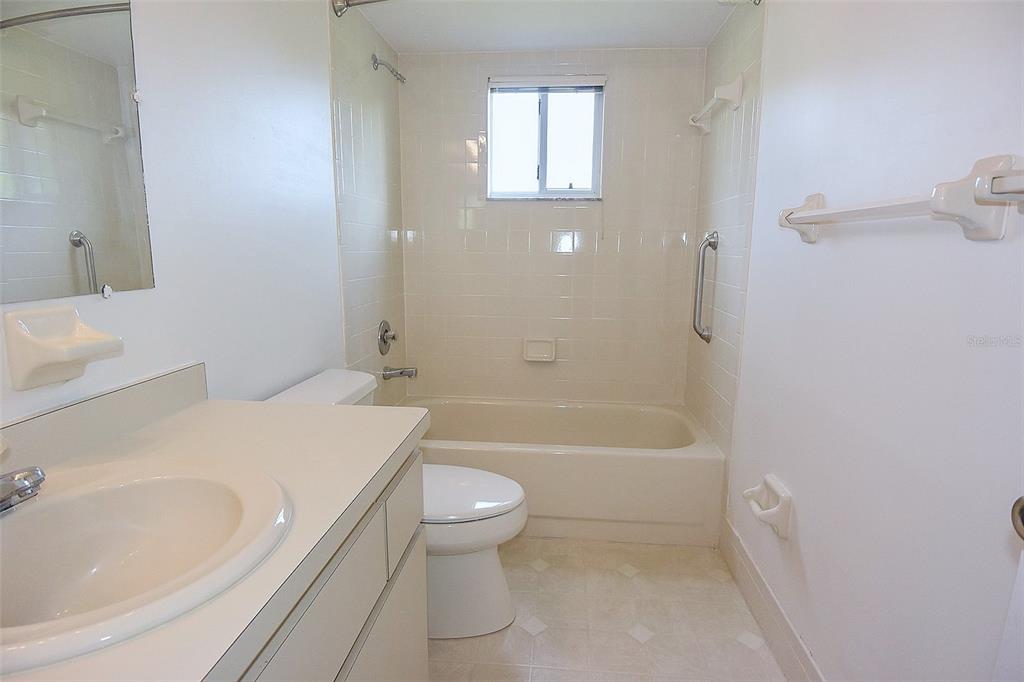 10980 Southwest 62nd Avenue Ocala, FL 34476 - Photo 24 of 48 a bathroom with a toilet a sink and bathtub