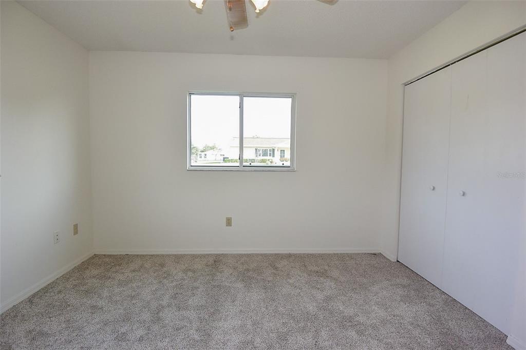 10980 Southwest 62nd Avenue Ocala, FL 34476 - Photo 25 of 48 an empty room with a window