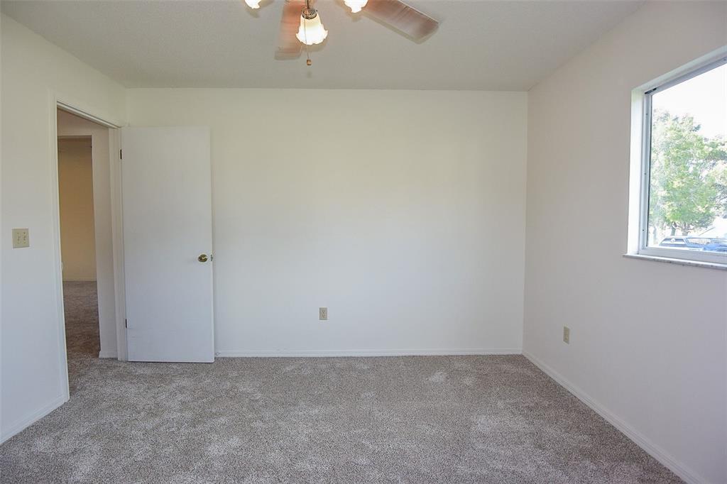 10980 Southwest 62nd Avenue Ocala, FL 34476 - Photo 26 of 48 an empty room with a window