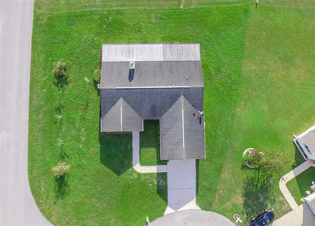 a house view with a garden space