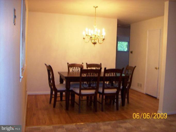 8208 Edwill Avenue Rosedale, MD 21237 - Photo 11 of 18 a view of a dining room with furniture