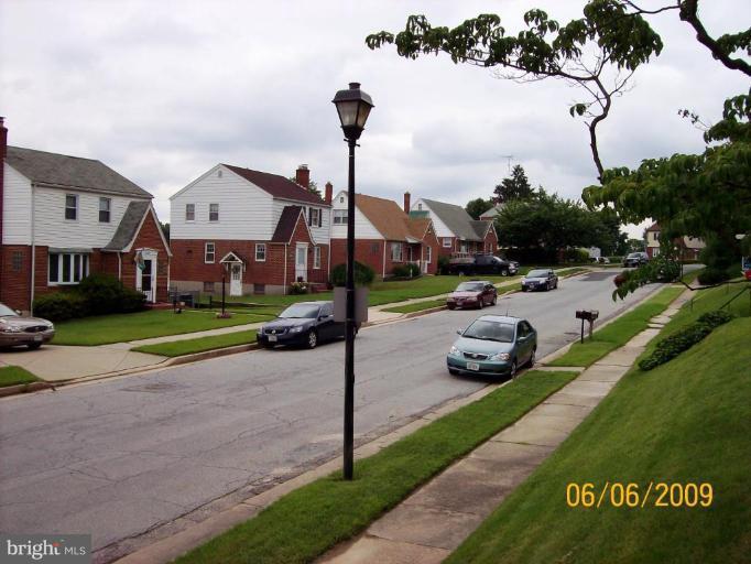 8208 Edwill Avenue Rosedale, MD 21237 - Photo 17 of 18 a view of a street with houses