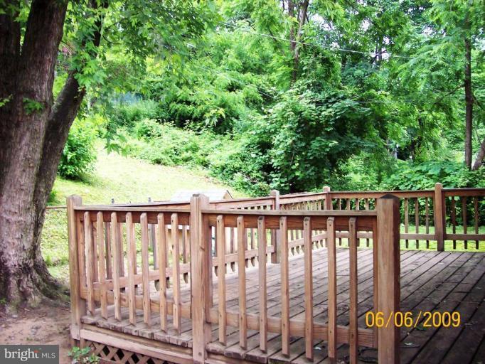 8208 Edwill Avenue Rosedale, MD 21237 - Photo 5 of 18 a view of a wooden fence