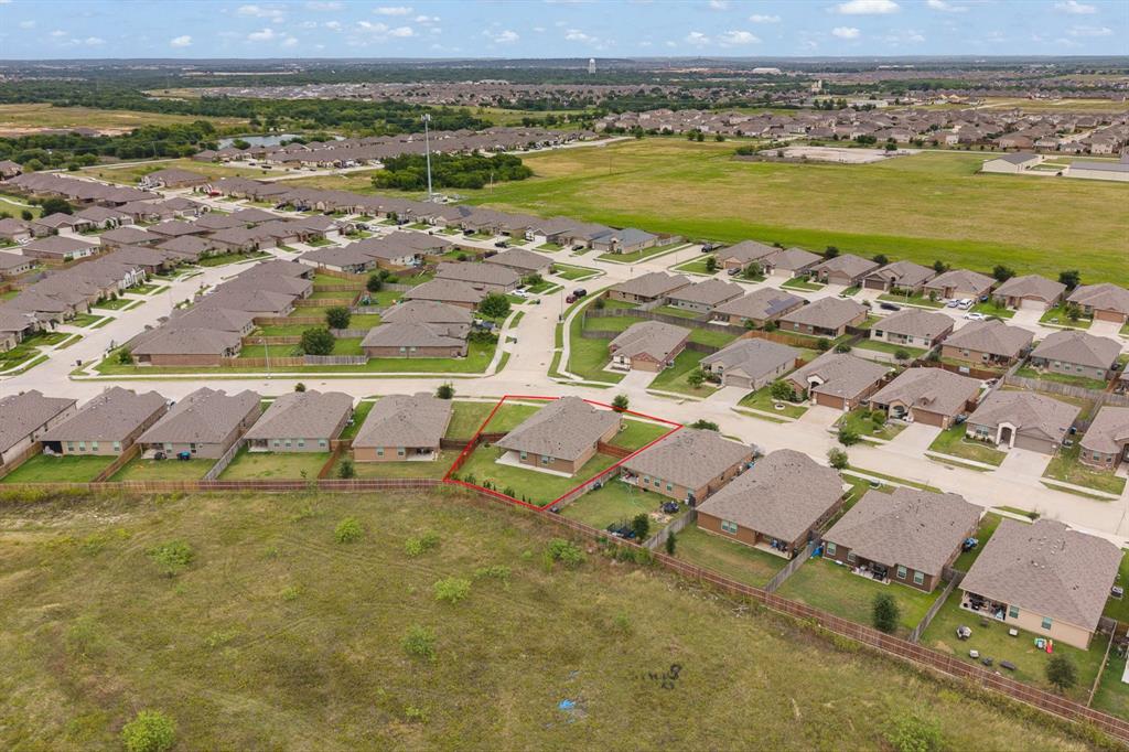 4600 Fringetree Way Crowley, TX 76036 - Photo 36 of 40 Aerial perspective highlighting a residential community with uniform housing styles