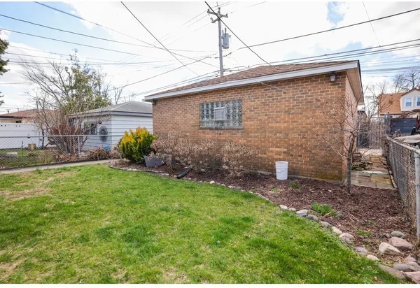 $379,000 | 4436 South Komensky Avenue, Chicago, IL 60632