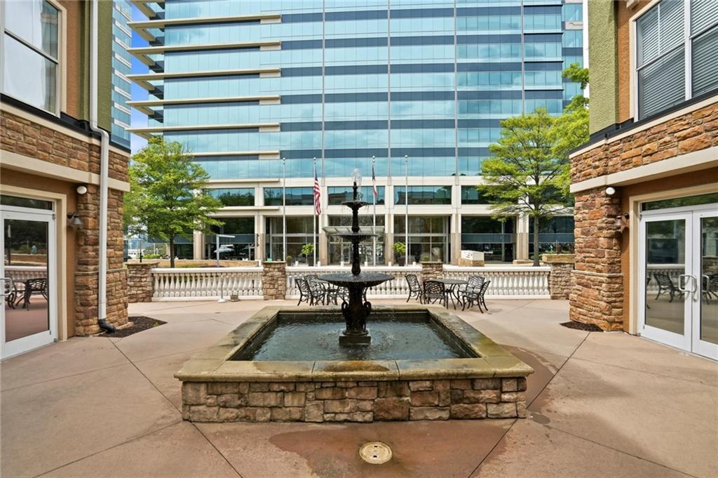 10 Perimeter Summit Boulevard, Unit 1204 Atlanta, GA 30319 - Photo 37 of 39 front view of a building with a garden