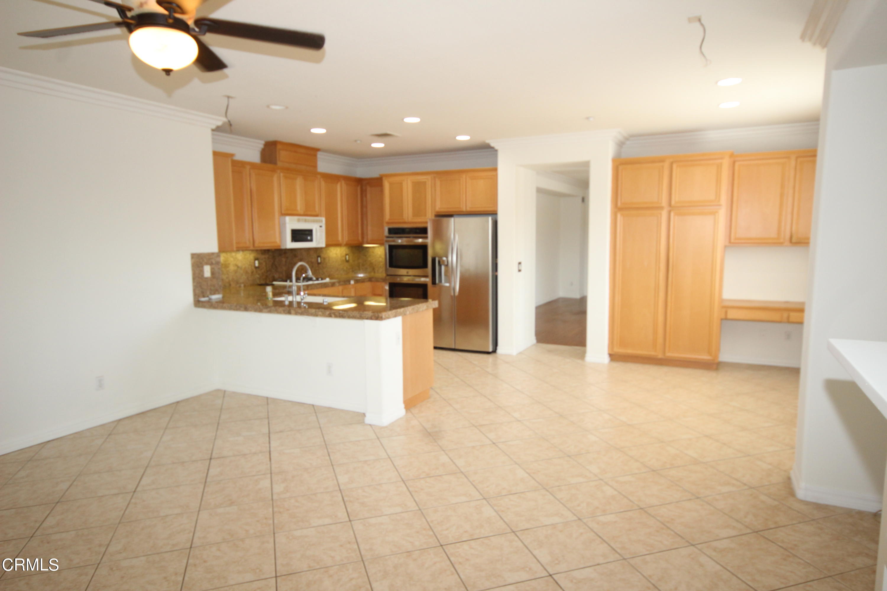 1034 Caliente Way Oxnard, CA 93036 - Photo 3 of 12 a view of kitchen with wooden floor