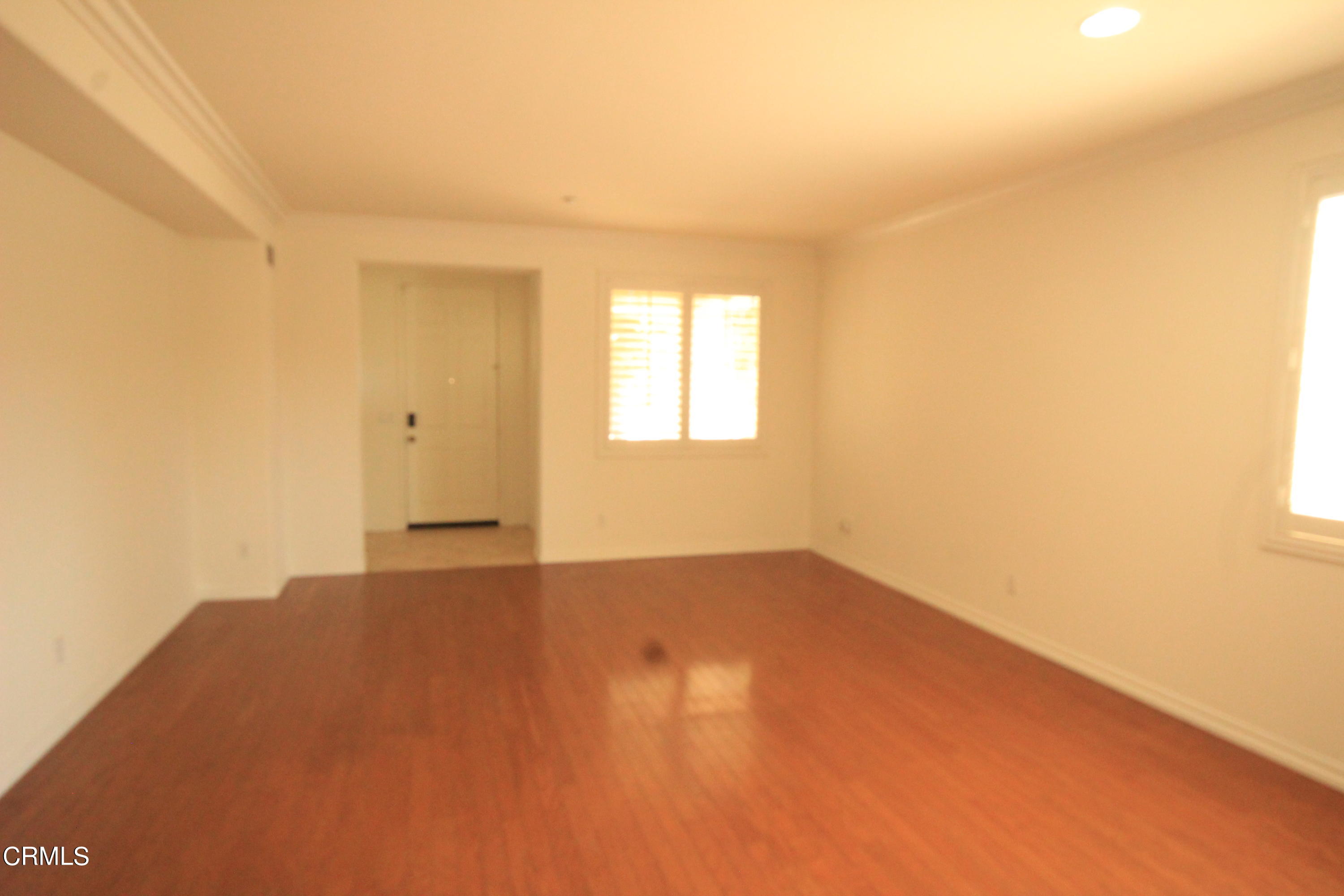 1034 Caliente Way Oxnard, CA 93036 - Photo 9 of 12 an empty room with a window