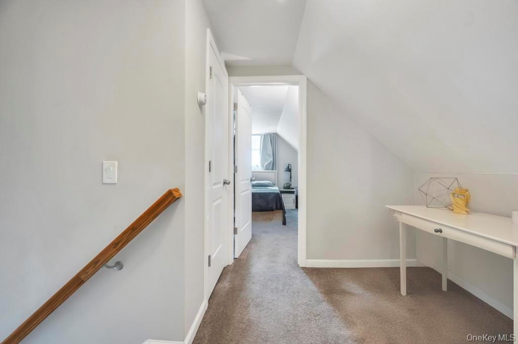 382 Boyle Road Selden, NY 11784 - Photo 20 of 26 a view of a hallway with workspace
