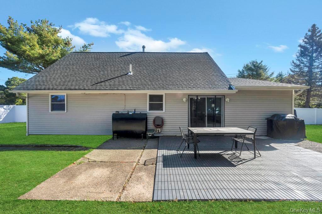 382 Boyle Road Selden, NY 11784 - Photo 6 of 26 a house view with a garden space