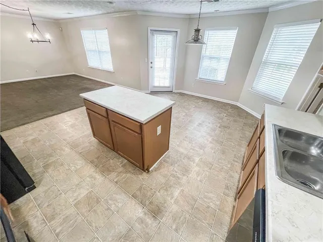 a view of cabinets and wooden floor