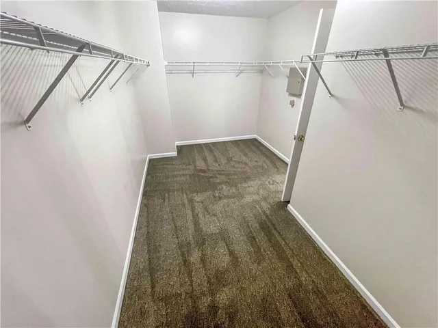 a bathroom with a tub and shower