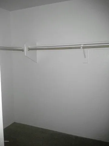 a view of small space with racks on the wall