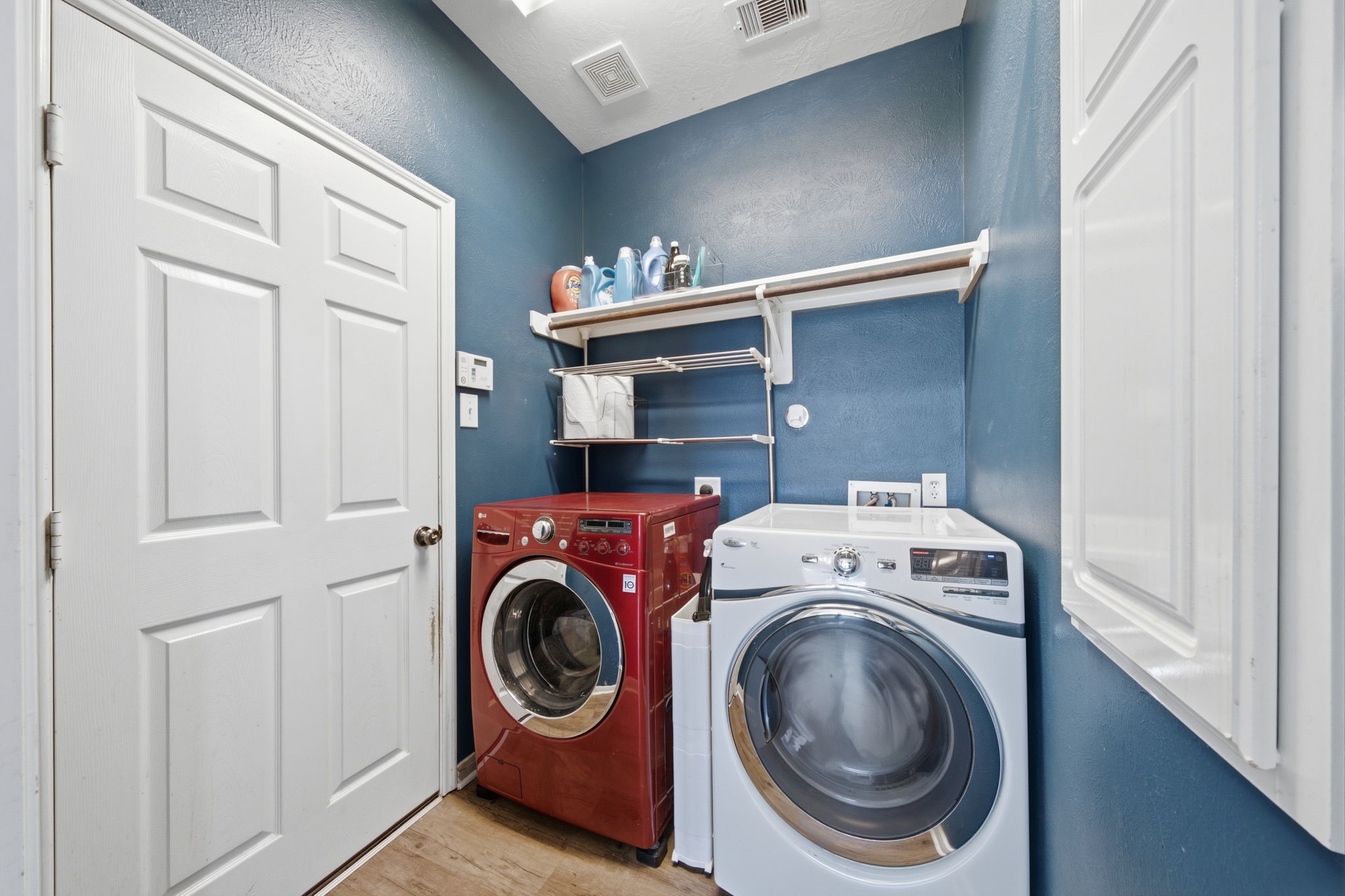 8911 Henrico Lane Rosenberg, TX 77469 - Photo 27 of 45 a utility room with dryer and washer