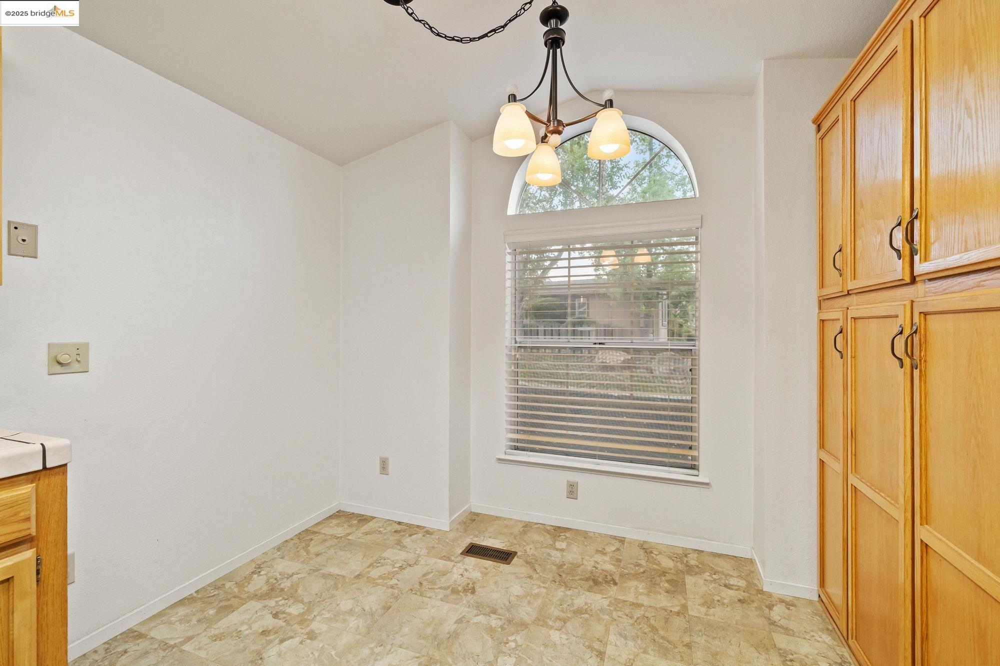19560 River Birch Court, Unit 1 Sonora, CA 95370 - Photo 11 of 38 a view of an empty room and window