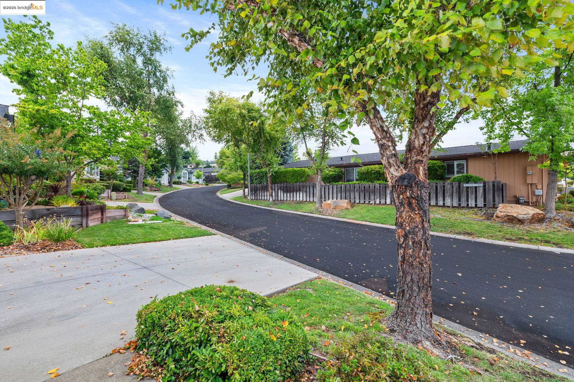 19560 River Birch Court, Unit 1 Sonora, CA 95370 - Photo 2 of 38 a front view of a house with garden