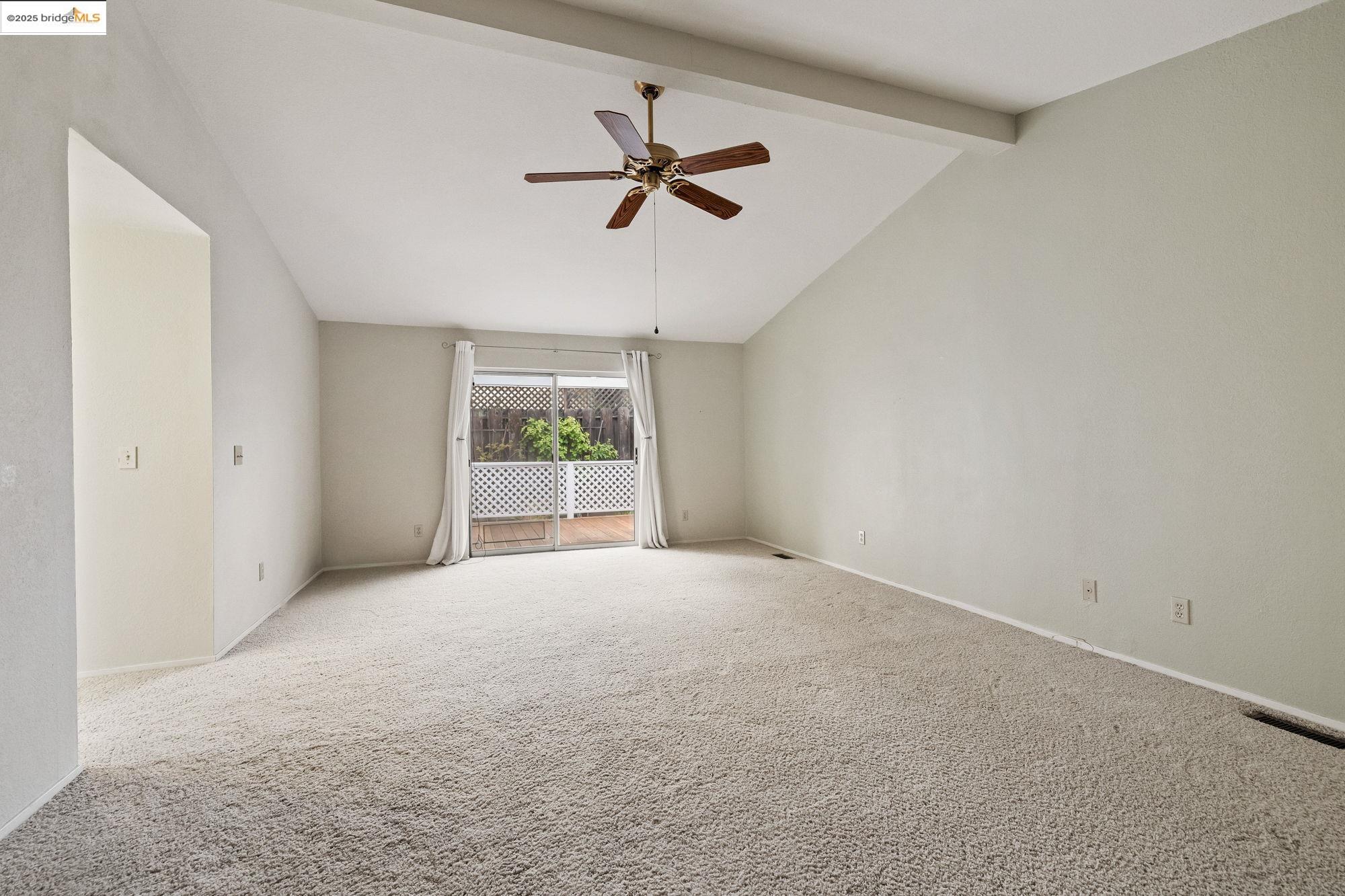 19560 River Birch Court, Unit 1 Sonora, CA 95370 - Photo 23 of 38 a view of a livingroom with a ceiling fan and window