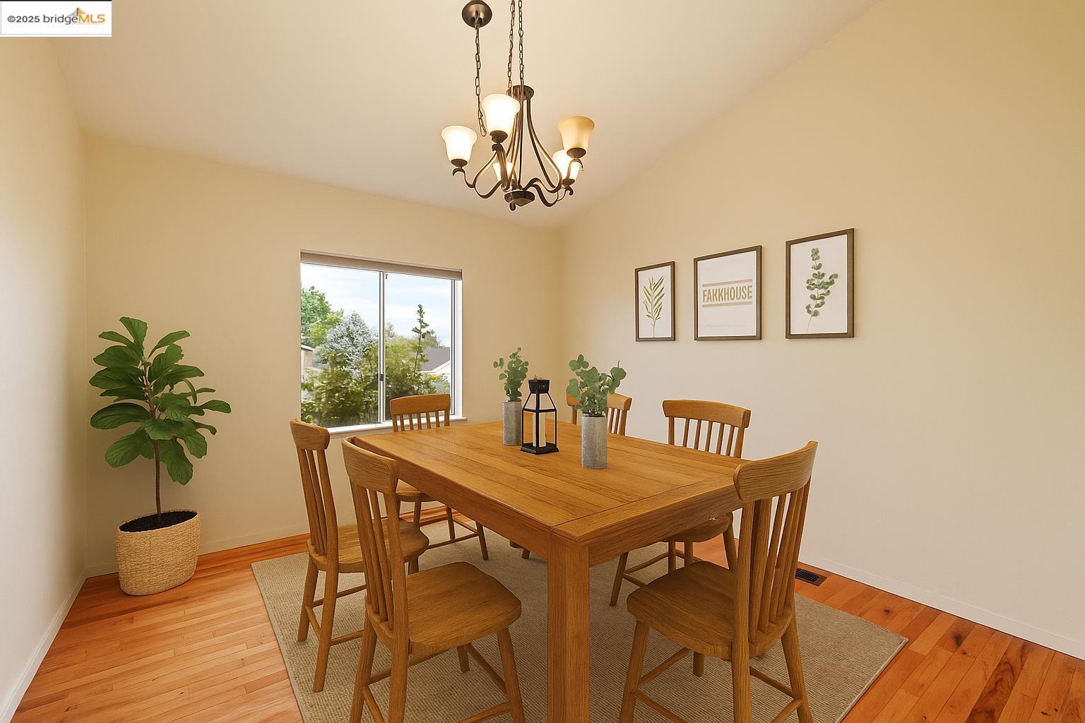 19560 River Birch Court, Unit 1 Sonora, CA 95370 - Photo 7 of 38 a view of a dining room with furniture window and wooden floor