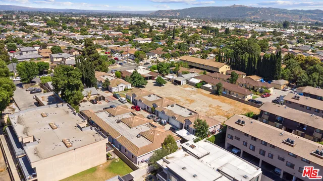 an aerial view of a city with lots of residential buildings