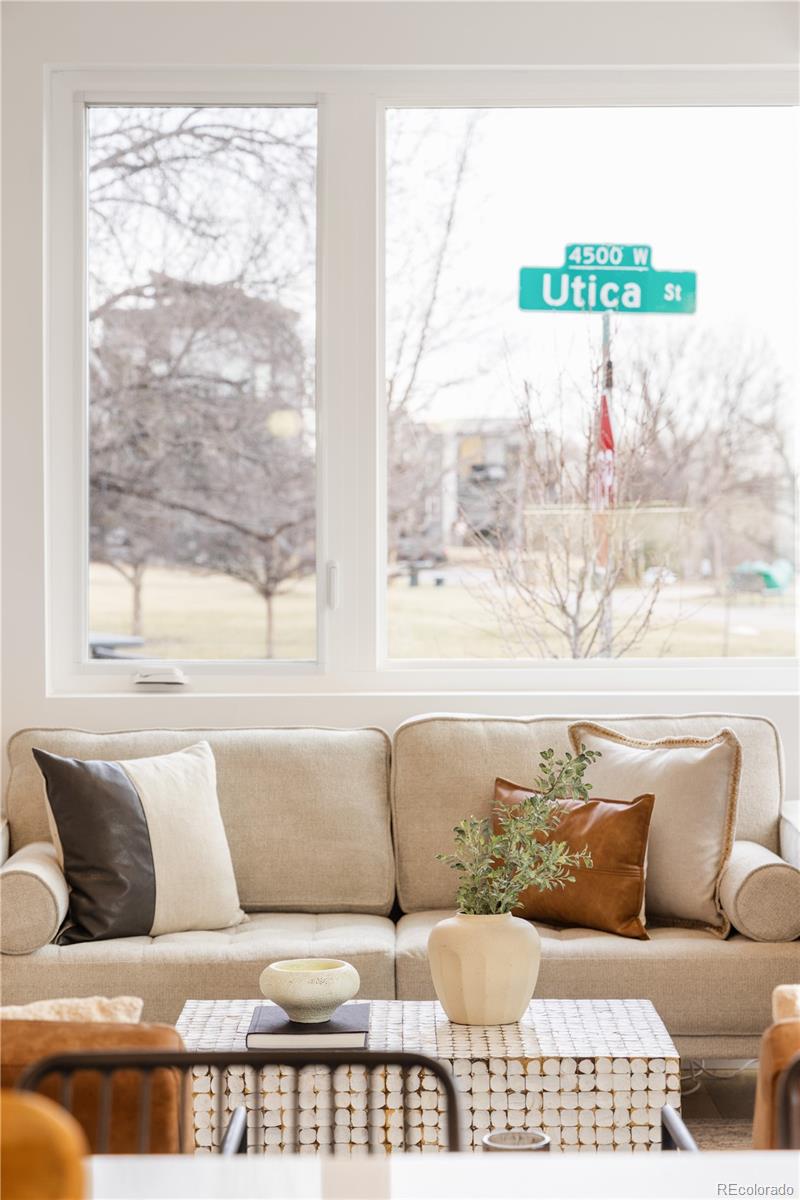 1205 Utica Street Denver, CO 80204 - Photo 29 of 35 a living room with a couch and a table