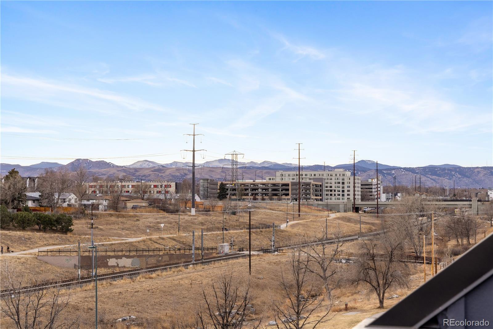 1205 Utica Street Denver, CO 80204 - Photo 33 of 35 a view of a lake with a mountain