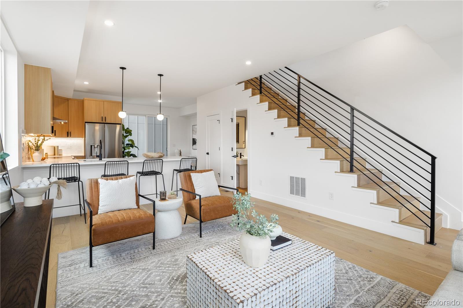 1205 Utica Street Denver, CO 80204 - Photo 5 of 35 a living room with furniture
