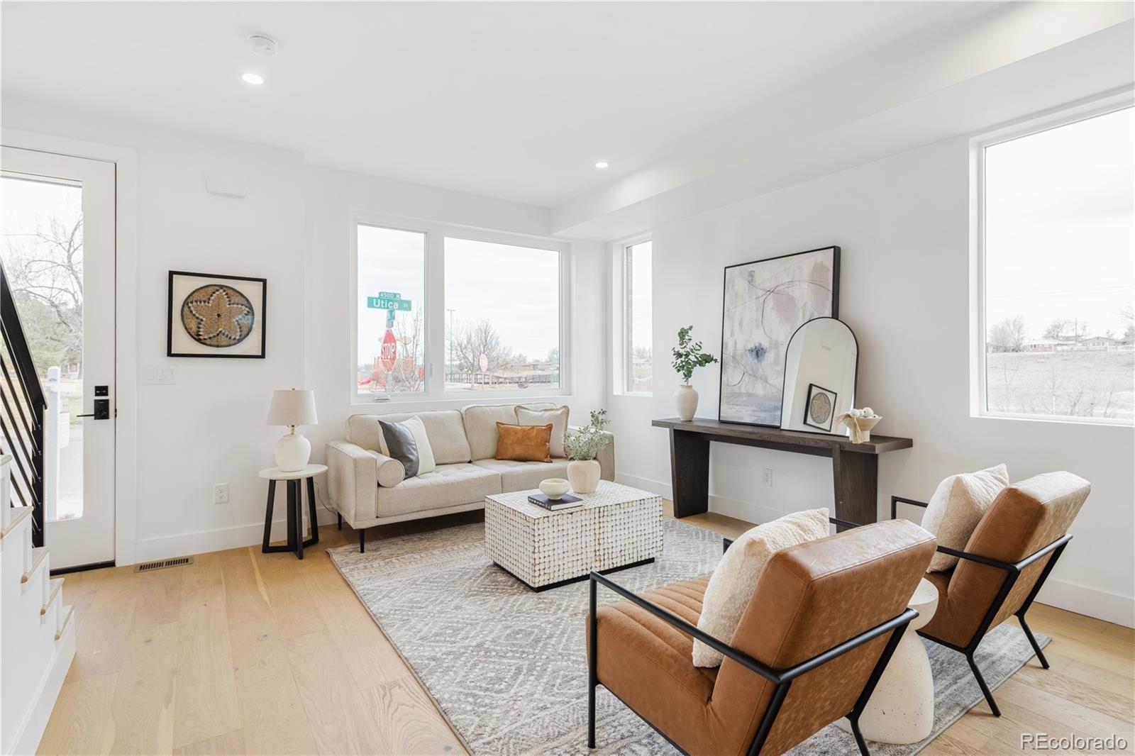 1205 Utica Street Denver, CO 80204 - Photo 8 of 35 a living room with furniture and a window