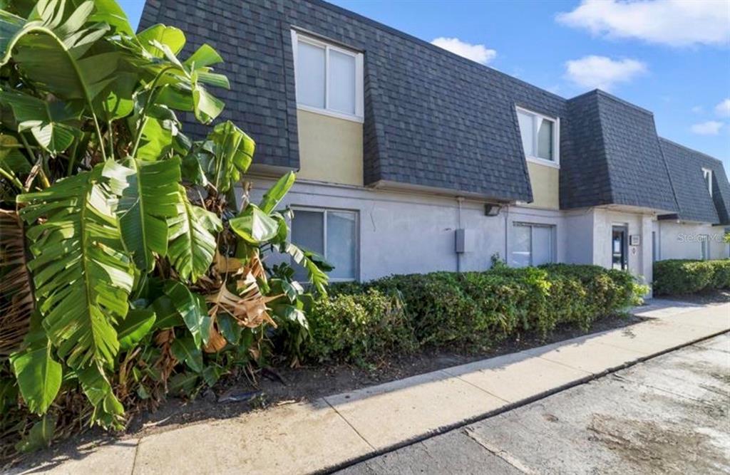 a view of a house with a garden