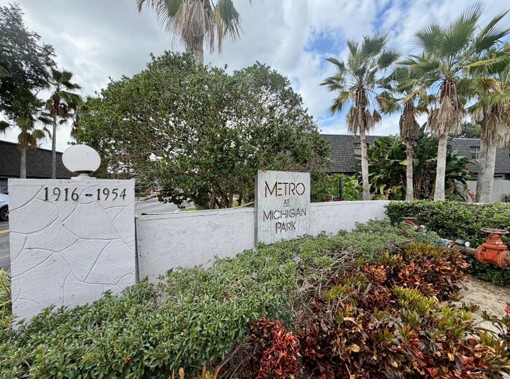 1938 South Conway Road, Unit 7 Orlando, FL 32812 - Photo 2 of 23 a view of sign board and potted plants