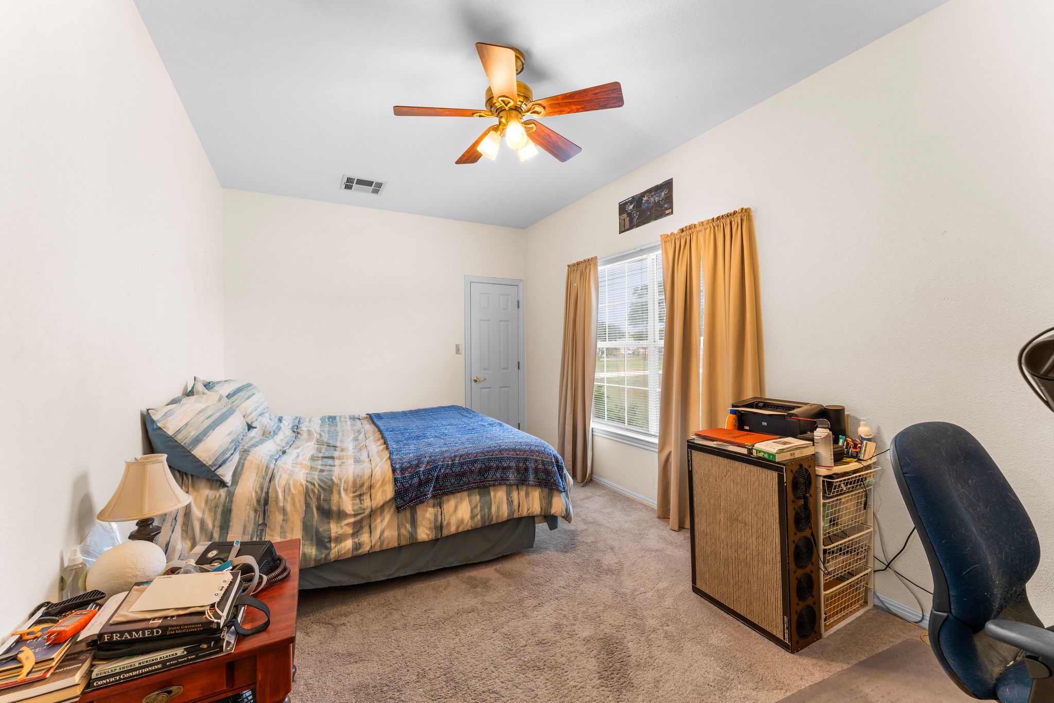 221 Breakaway Road Cedar Park, TX 78613 - Photo 35 of 39 Guest bedroom with carpet flooring, a desk, and ceiling fan